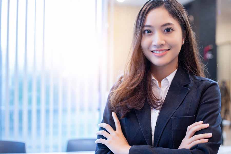 confident apply singapore pr consultant smiling