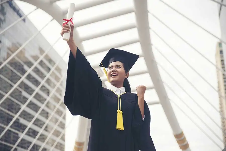 new graduate celebraing her graduation